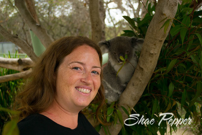 Shae petting a Koala at Australia Walkabout Wildlife Park