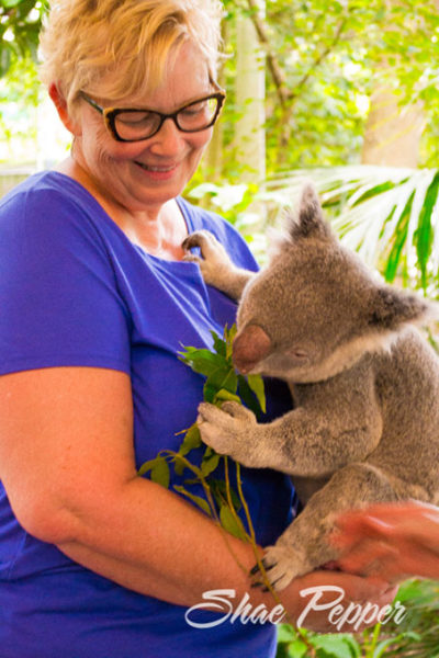 Mom holding a koala