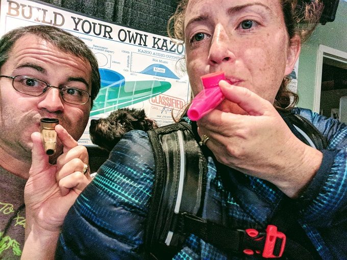 Testing out the kazoos we made at the Kazoobie Kazoo Factory