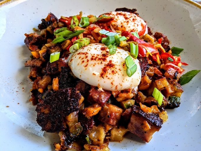 Stephen's Skillet Hash at Hotel Covington - pastrami, sweet potato, poached eggs and pickled fresno chilis