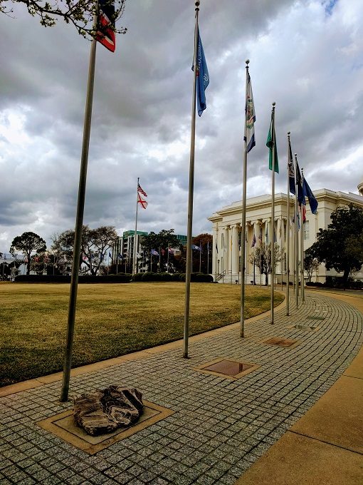 State flags & stone markers outside the Alabama State Capitol building, Montgomery, Alabama