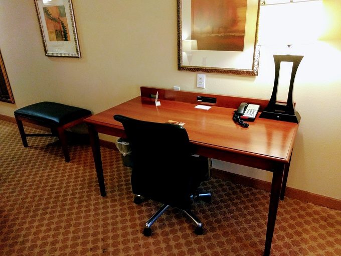Country Inn & Suites Saraland, Alabama - Desk, office chair and padded bench