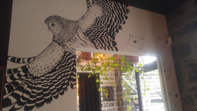 Owl wall art at Lockhart Bar, Montreal
