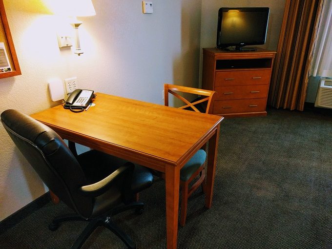 Candlewood Suites La Crosse WI - Table, chairs, dresser & TV