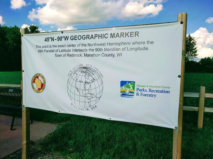 Sign about the 45 x 90 Geographical Marker, Athens WI