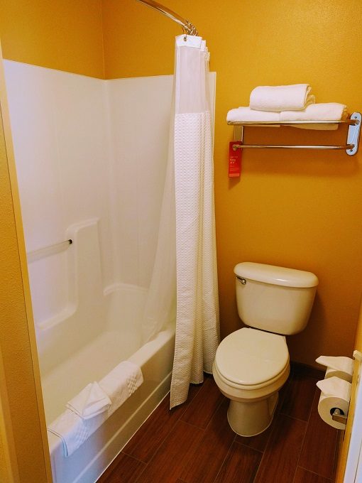 TownePlace Suites Chicago Naperville, Illinois - Bathtub with shower and toilet in bathroom 1