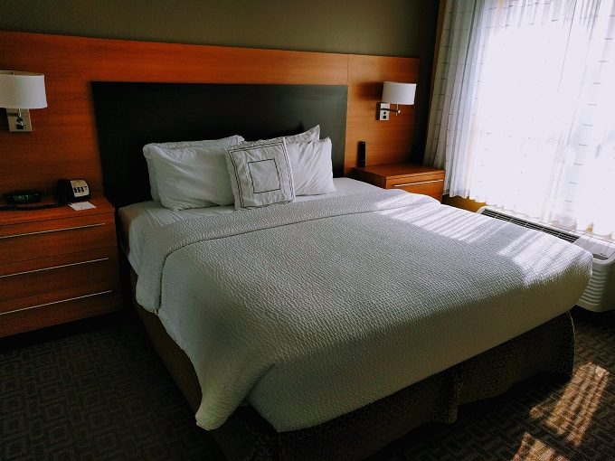 TownePlace Suites Chicago Naperville, Illinois - King bed in bedroom 1