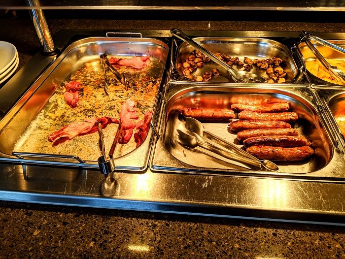 Comfort Inn Arundel, UK breakfast - Bacon, sausages & mushrooms