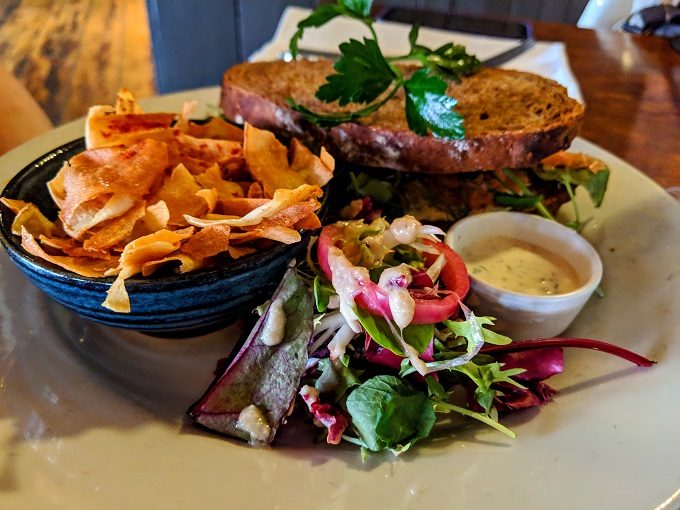 Roast pepper, goat's cheese & passion fruit syrup sandwich with parsnip chips at Artichoke Cafe in Chester, England