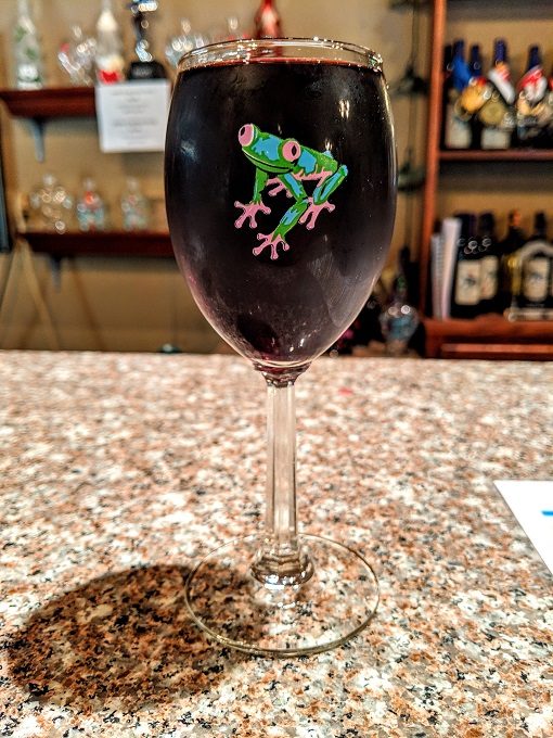Glass of Black & Bruised wine at Purple Toad Winery in Paducah, Kentucky