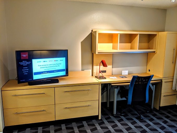 TownePlace Suites Winchester, Virginia - Desk, storage unit & TV