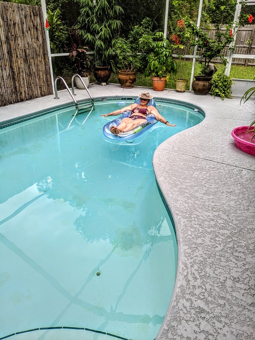 Mom enjoying the swimming pool at our Airbnb