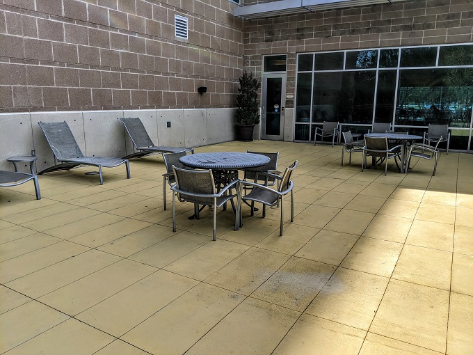 Embassy Suites Hampton Convention Center, VA - Seating outside of pool area