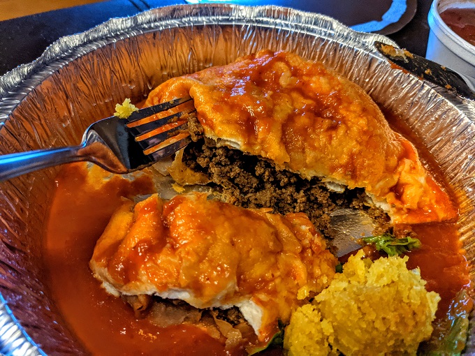 Ground beef stuffed sopaipilla with red chile from Sopaipilla Factory