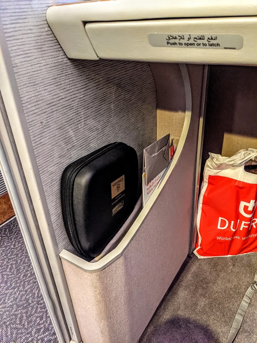 Emirates First Class - Headphones and storage