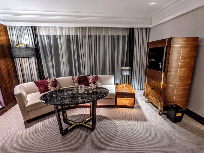 Grand Hyatt Dubai - Living room couch, table & mini bar