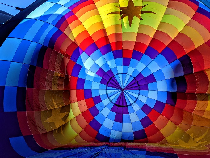Inside a hot air balloon while it inflated