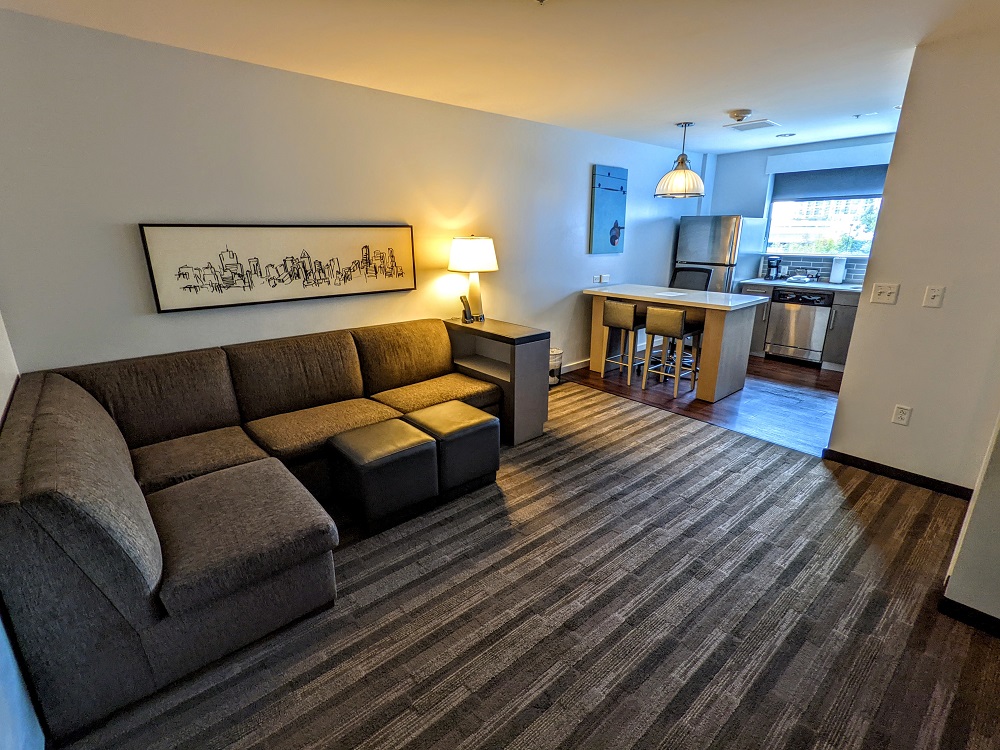 Living room & kitchen of our one bedroom suite at the Hyatt House Irvine John Wayne Airport