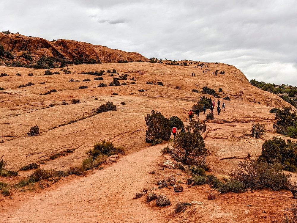 Follow the Delicate Arch trail up the slickrock