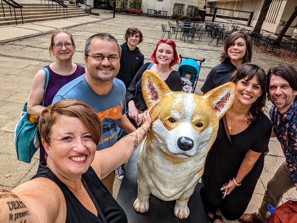 The nine of us with one of the Queen's corgis (sort of)