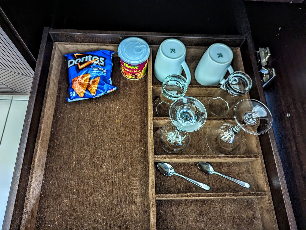 Hilton Mauritius Resort & Spa - Mini bar snacks, mugs & drinking glasses