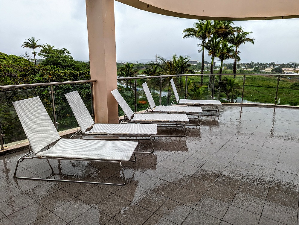Holiday Inn Mauritius Mon Tresor - Sun loungers outside the fitness and spa areas