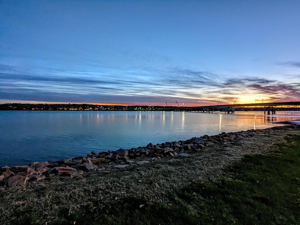 View along the Missouri River in Steamboat Park at night time