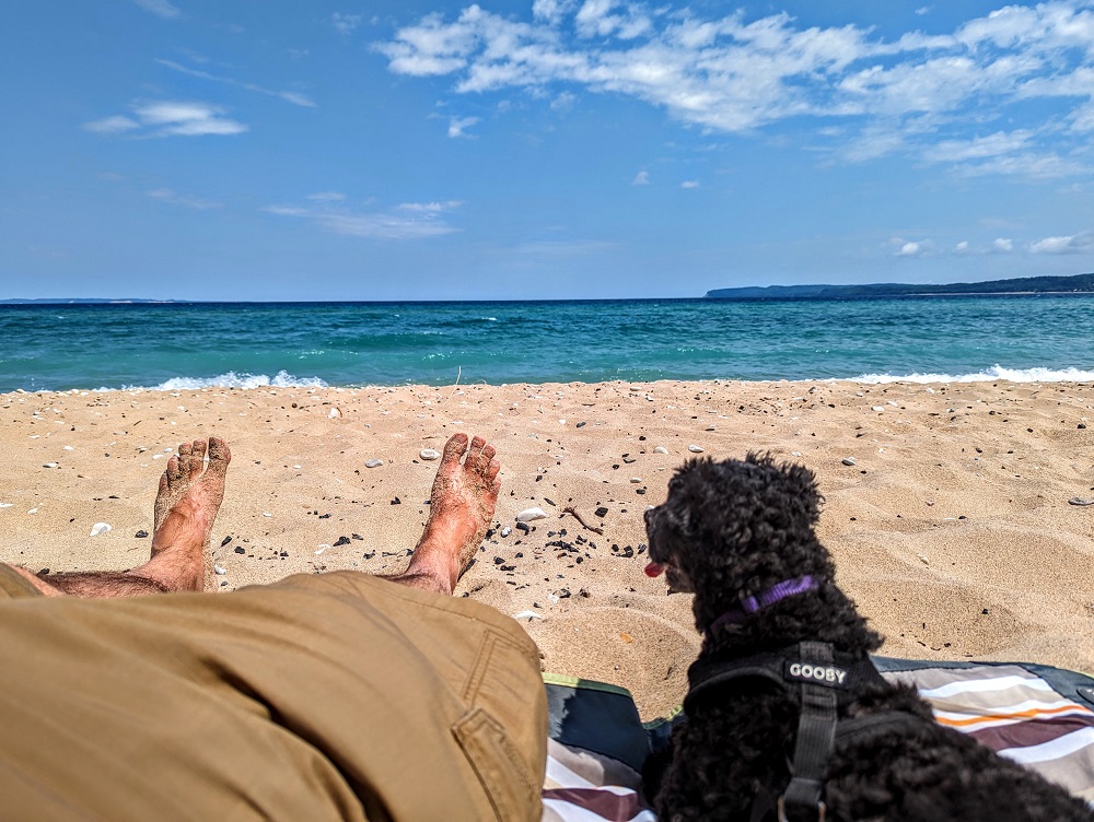 Truffles and I resting on Glen Haven beach