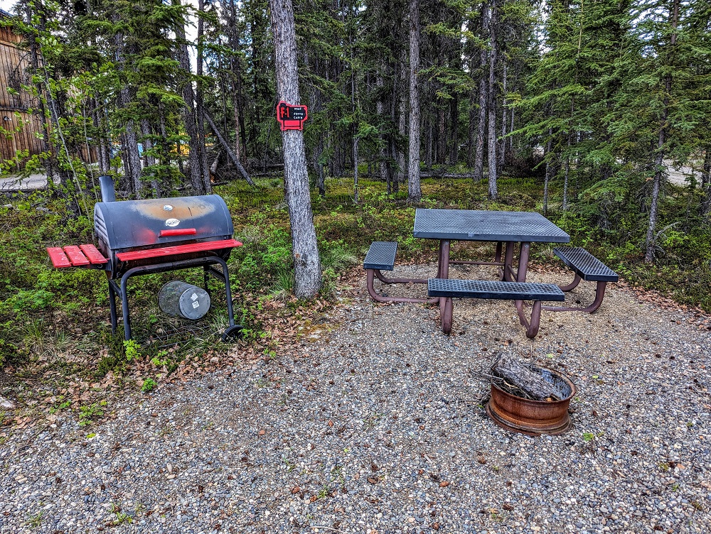 Alaskan Stoves Campground in Tok, AK - Grill & picnic table