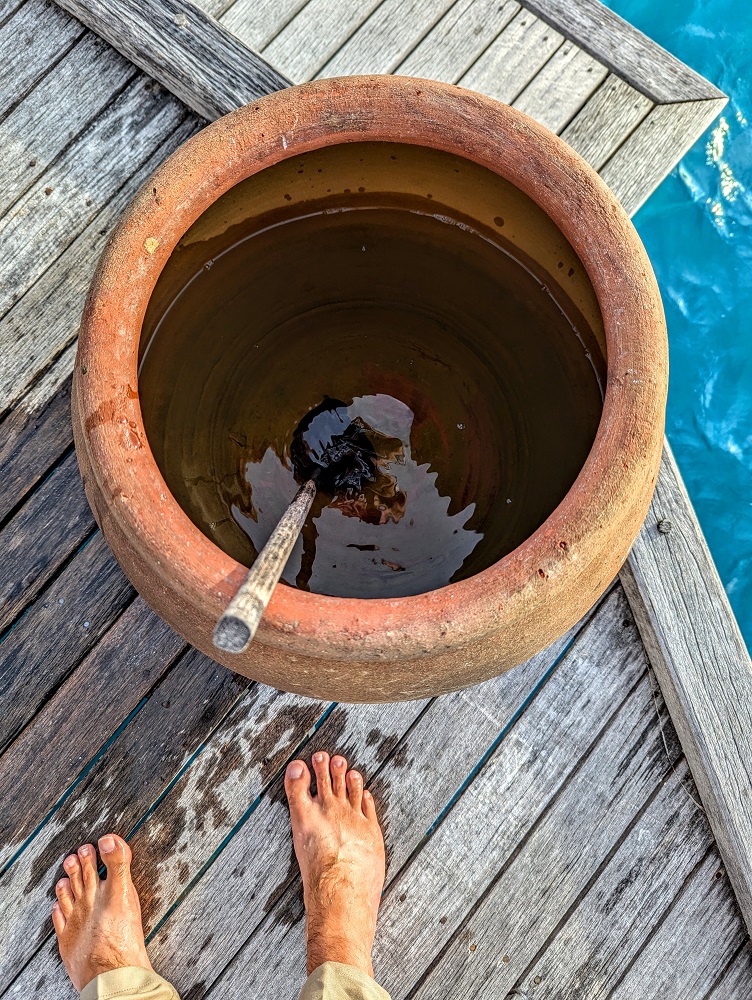 Water jar to rinse our feet when entering