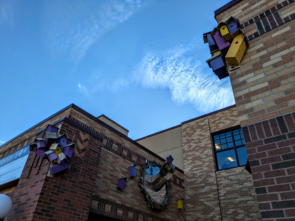 Thomas Dambo Detroit Lakes trolls - Mirror portal at Detroit Lakes Community & Cultural center