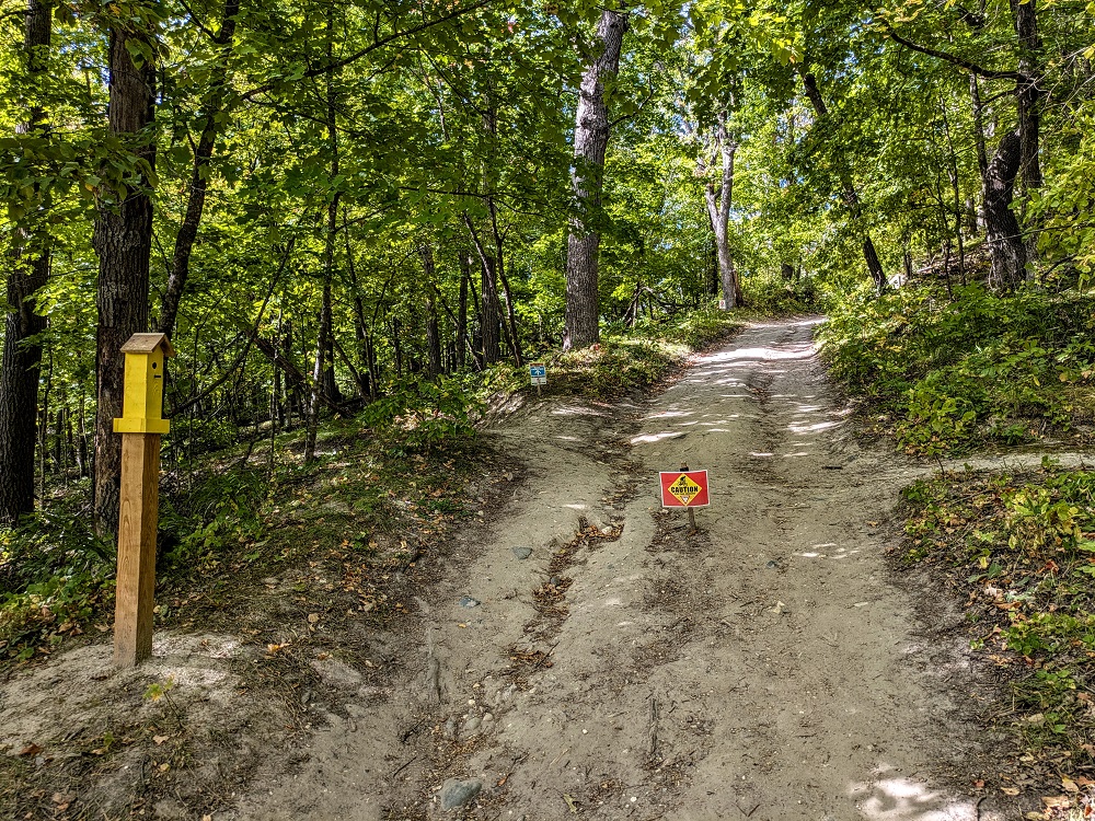 Walk up the hill following the bird houses
