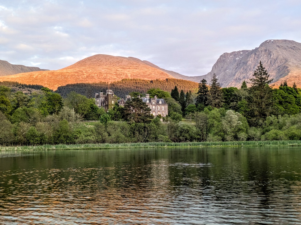 View of Inverlochy Castle Hotel from its loch