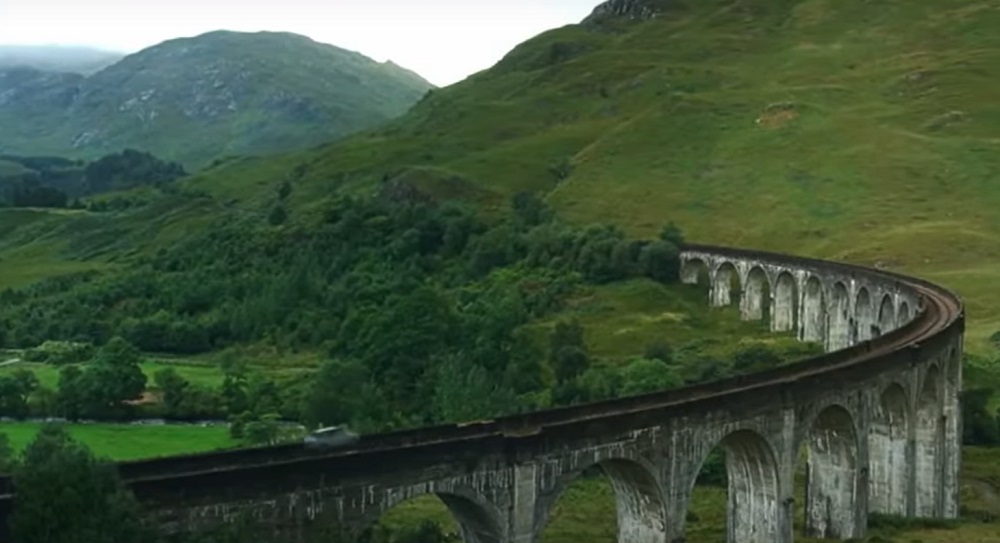 Screenshot of the flying Ford Anglia on the Glenfinnan Viaduct
