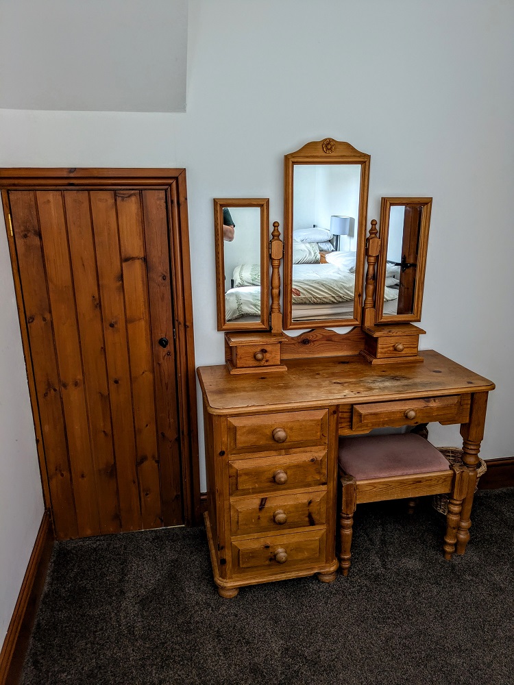 Closet and desk in second bedroom