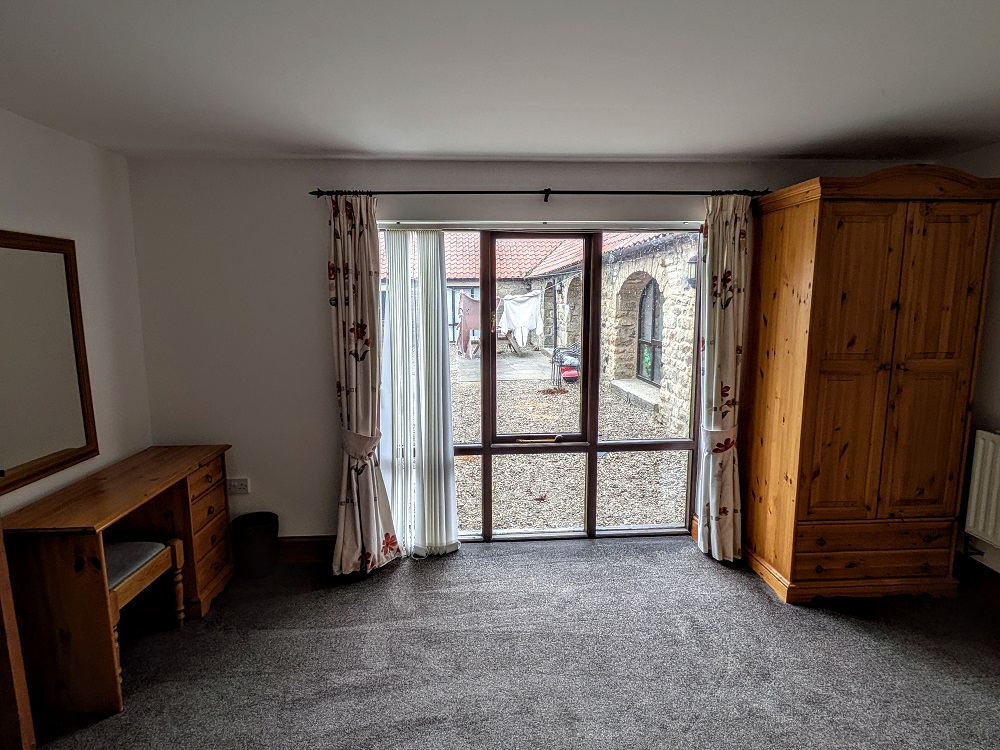 Other side of the bedroom