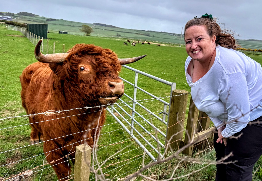 Shae and the Highland cow