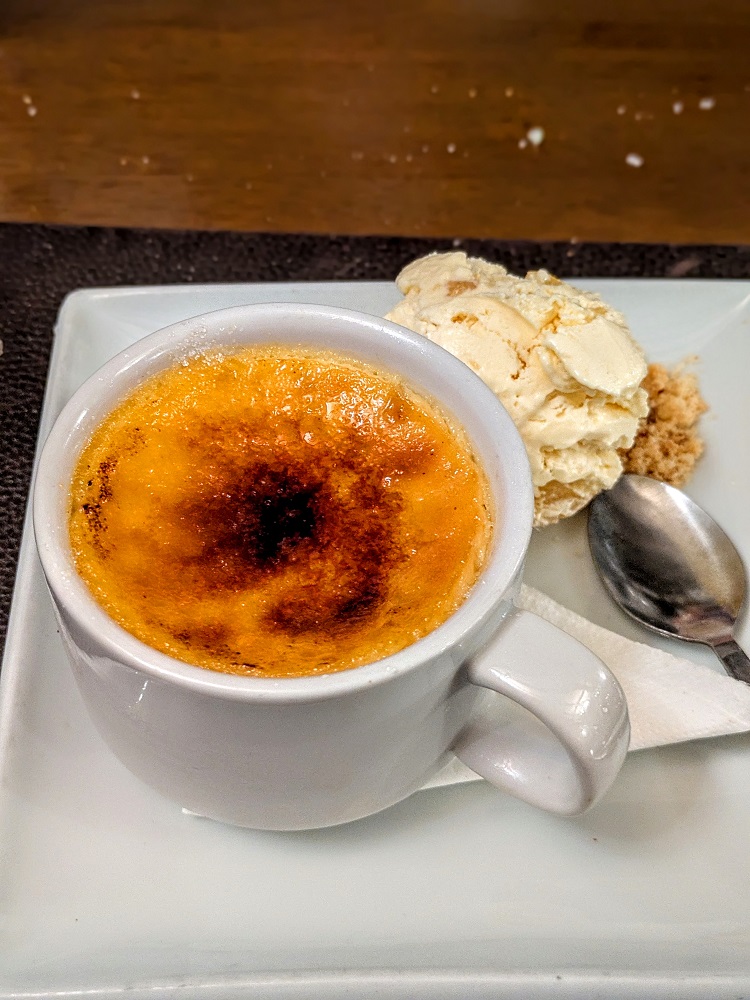 Rhubarb and custard crème brûlée with stem ginger ice cream at The Old Kings Arms Hotel & Bar in Pembroke