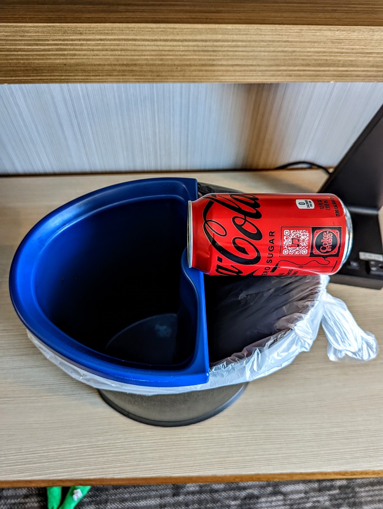 One of the small trash cans we encountered (Coke Zero can for scale)